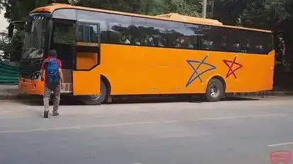 Hans India Tour Bus-Side Image