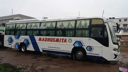 MADHUSMITA TOURS & TRAVELS Bus-Side Image