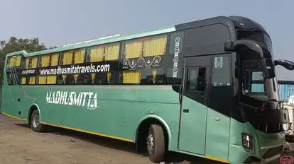 MADHUSMITA TOURS & TRAVELS Bus-Side Image