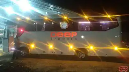 Deep Travels Bus-Side Image
