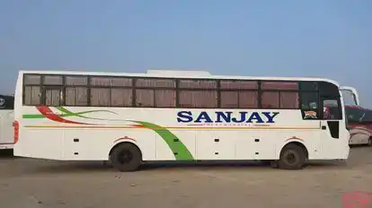 SANJAY TOURS AND TRAVELS. Bus-Side Image