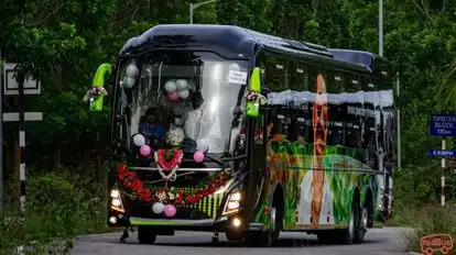 Punchiry Travels and Holidays Bus-Front Image
