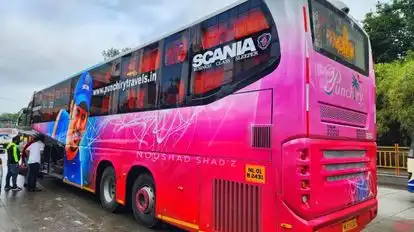 Punchiry Travels and Holidays Bus-Side Image