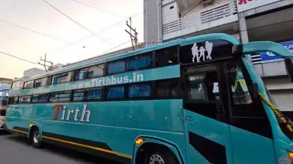 TIRTH TRAVELS Bus-Side Image