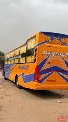 Mansoori tour and travels Bus-Side Image