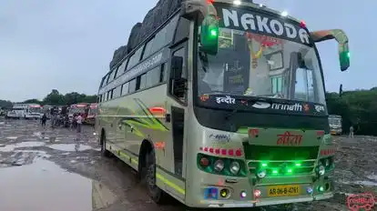 Nakoda Holiday Makers India Pvt Ltd. Bus-Side Image