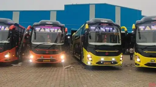 Tantia Travels & Cargo Bus-Front Image