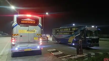 SIDDHESHWAR TOURS AND TRAVELS Bus-Side Image