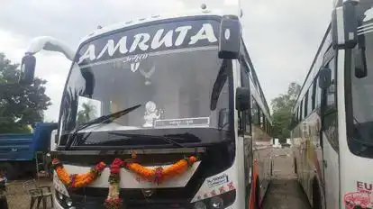 AMRUTA TOURS AND TRAVELS Bus-Front Image