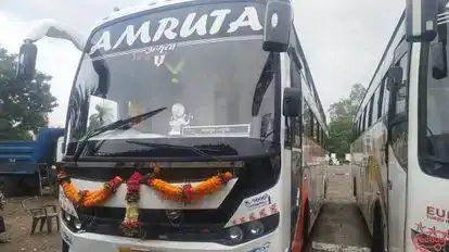 AMRUTA TOURS AND TRAVELS Bus-Front Image