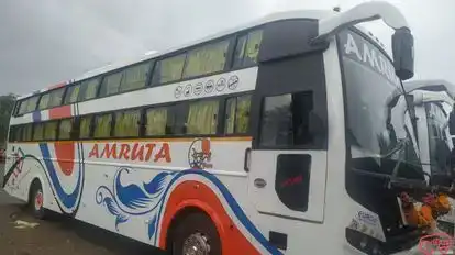 AMRUTA TOURS AND TRAVELS Bus-Side Image