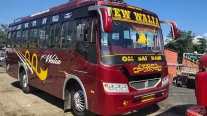 NEW WALIA TRAVELS  Bus-Side Image