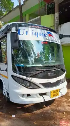 UNIQUE TOURS AND TRAVELS Bus-Front Image