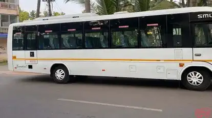 UNIQUE TOURS AND TRAVELS Bus-Side Image