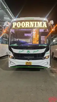 Poornima Tours Bus-Front Image