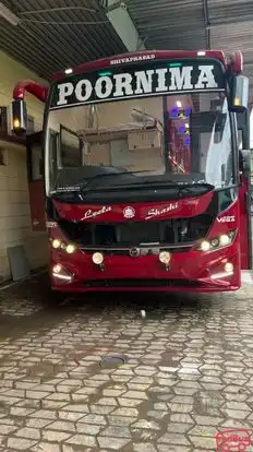Poornima Tours Bus-Front Image