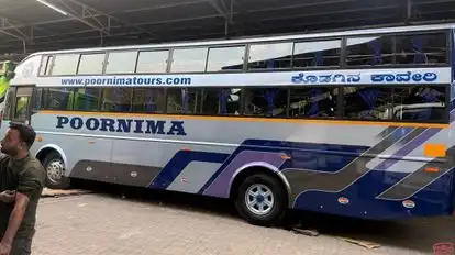 Poornima Tours Bus-Side Image