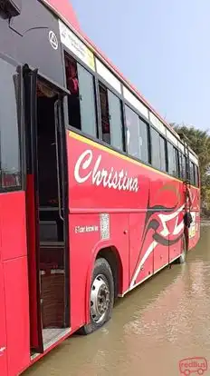 Christina Travels Bus-Side Image