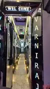 VARNIRAJ TRAVELS Bus-Front Image