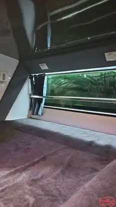 VARNIRAJ TRAVELS Bus-Front Image