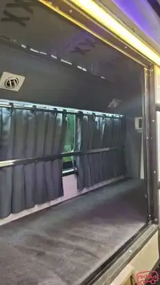 VARNIRAJ TRAVELS Bus-Side Image