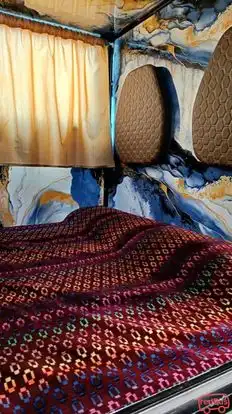 Rajmata Travels Bus-Side Image