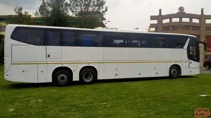 Triptara tour & Travel Bus-Side Image