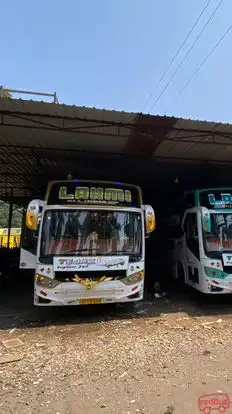 Laxmi Travels And Cargo Bus-Front Image