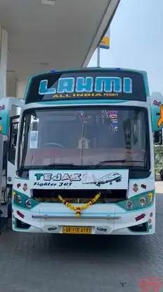 Laxmi Travels And Cargo Bus-Front Image