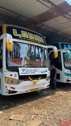 Laxmi Travels And Cargo Bus-Front Image