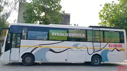 Sunrise tour's & travels Bus-Side Image