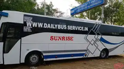 Sunrise tour's & travels Bus-Side Image