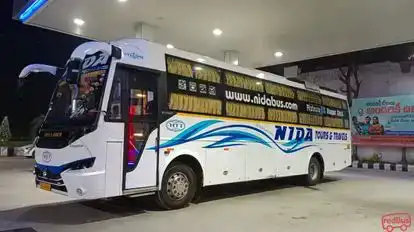 Nida Tours and Travels Bus-Side Image
