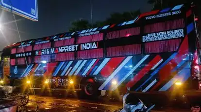 Shub Yatra Holidays Bus-Side Image