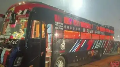 Shub Yatra Holidays Bus-Side Image