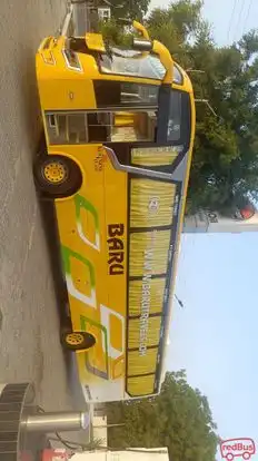 Baru travels Bus-Side Image