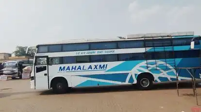 Mahalakshmi travels Bus-Side Image