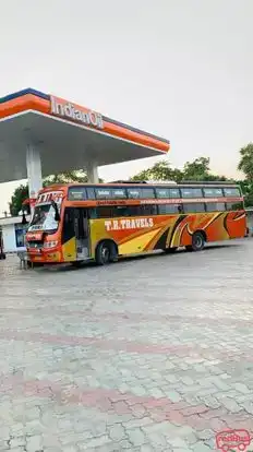 T.R. JANI TRAVELS Bus-Side Image