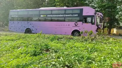 November Travels Bus-Side Image