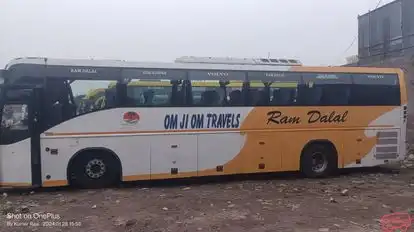 Om Ji Om Travels  Bus-Side Image