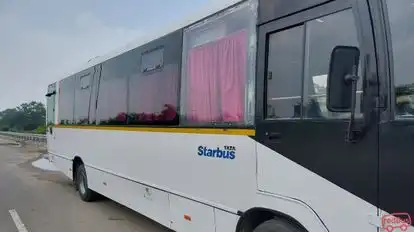 SHRINET TOUR AND TRAVELS Bus-Side Image