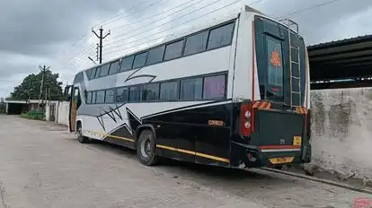 DEVANSHI TRAVELS Bus-Side Image