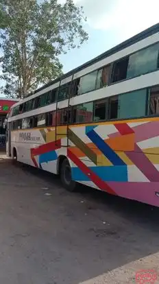 Pooja Travel Point Bus-Side Image