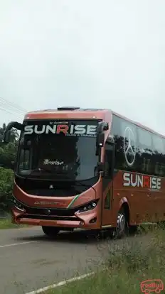 Sunrise Tours and Travels Bus-Side Image