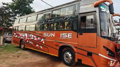 Sunrise Tours and Travels Bus-Side Image