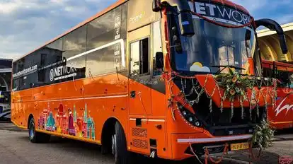 NETWORK TRAVELS Bus-Side Image