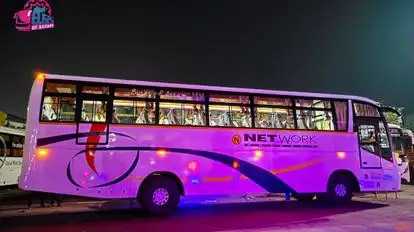 NETWORK TRAVELS Bus-Side Image