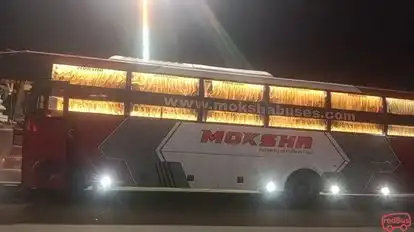 Moksha Travels Bus-Side Image