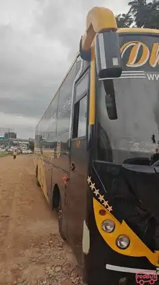 DHANUNJAYA TRAVELS Bus-Side Image