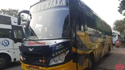 DHANUNJAYA TRAVELS Bus-Side Image